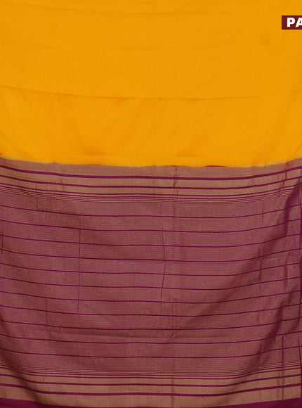 Semi crepe saree mango yellow and purple with plain body and zari woven border