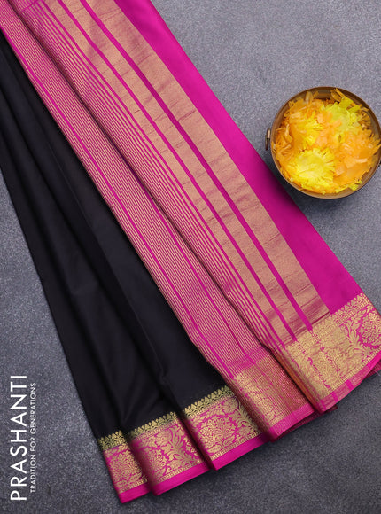 Semi crepe saree black and pink with plain body and zari woven border