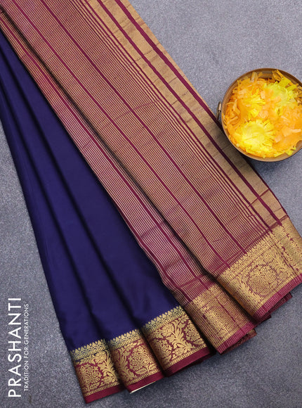 Semi crepe saree navy blue and wine shade with plain body and zari woven border