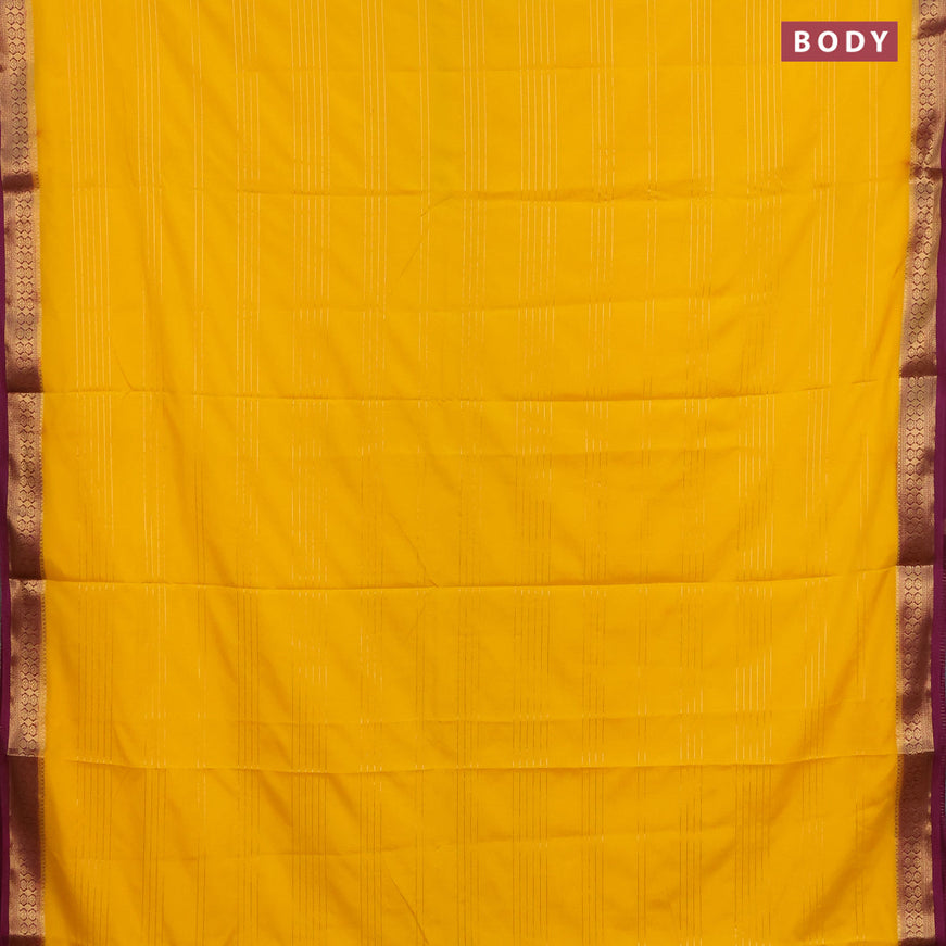 Semi crepe saree yellow and purple with allover zari stripe pattern and zari woven border