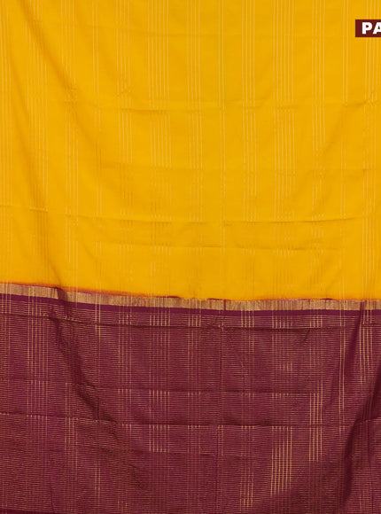 Semi crepe saree yellow and purple with allover zari stripe pattern and zari woven border