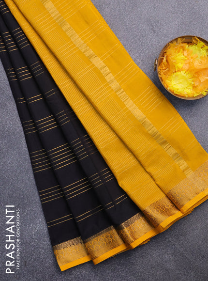 Semi crepe saree black and mango yellow with allover zari stripe pattern and zari woven border