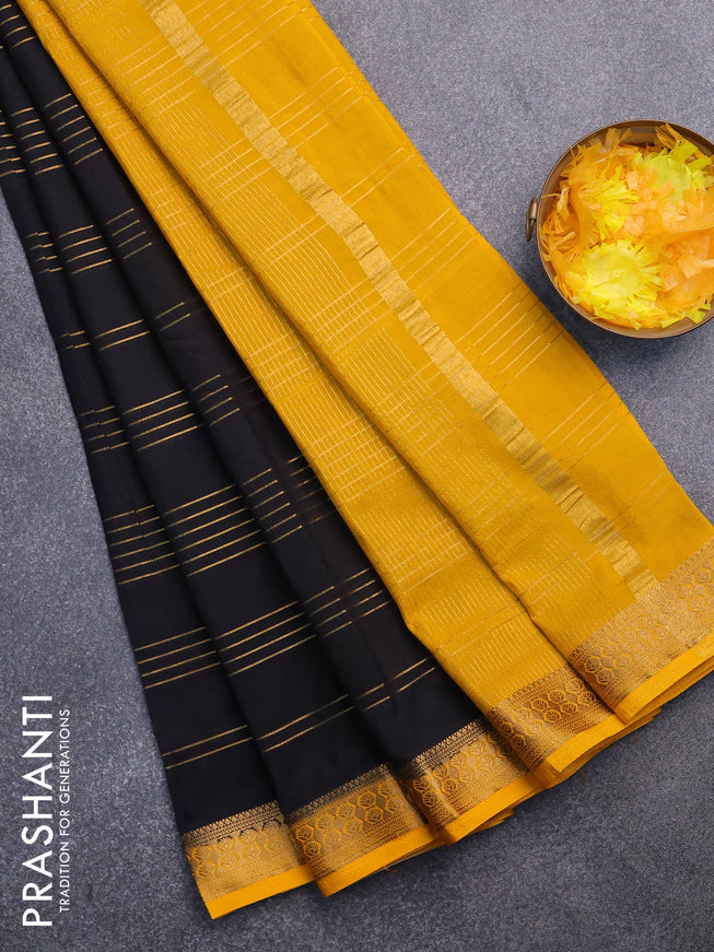 Semi crepe saree black and mango yellow with allover zari stripe pattern and zari woven border