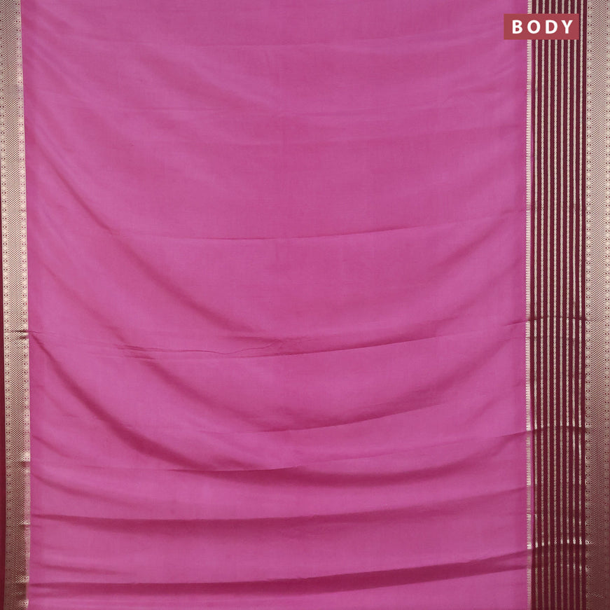 Semi crepe saree mauve pink and wine shade with plain body and long zari woven border