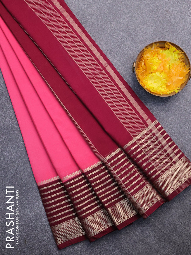 Semi crepe saree peach pink and wine shade with plain body and long zari woven border