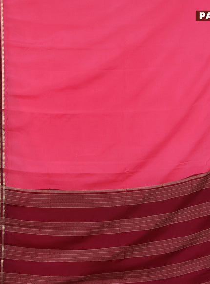 Semi crepe saree peach pink and wine shade with plain body and long zari woven border