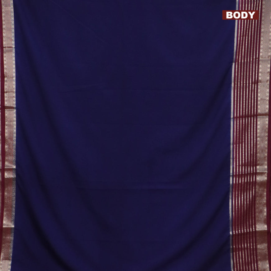 Semi crepe saree navy blue and wine shade with plain body and long zari woven border