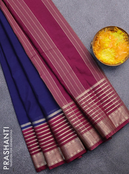 Semi crepe saree navy blue and wine shade with plain body and long zari woven border