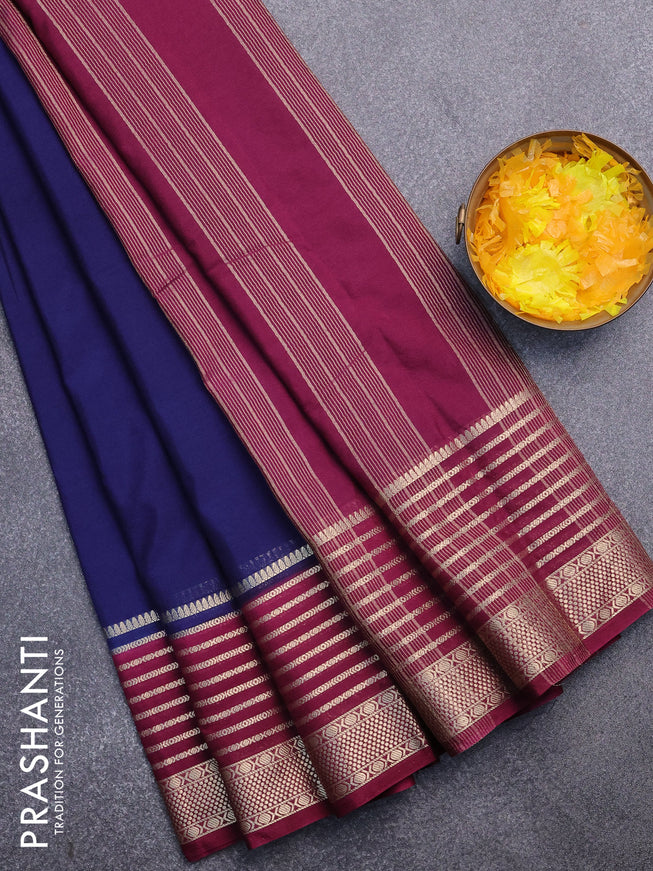 Semi crepe saree navy blue and wine shade with plain body and long zari woven border