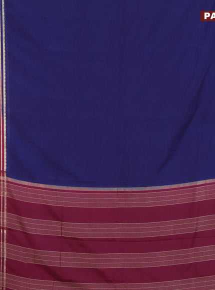 Semi crepe saree navy blue and wine shade with plain body and long zari woven border