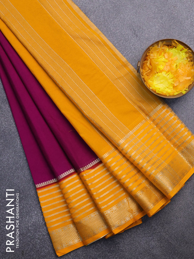 Semi crepe saree purple and mango yellow with plain body and long zari woven border