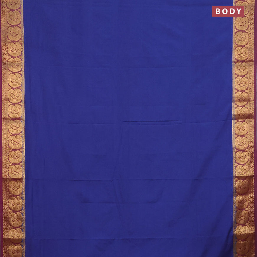 Semi crepe saree dark blue and deep purple with plain body and paisley zari woven border