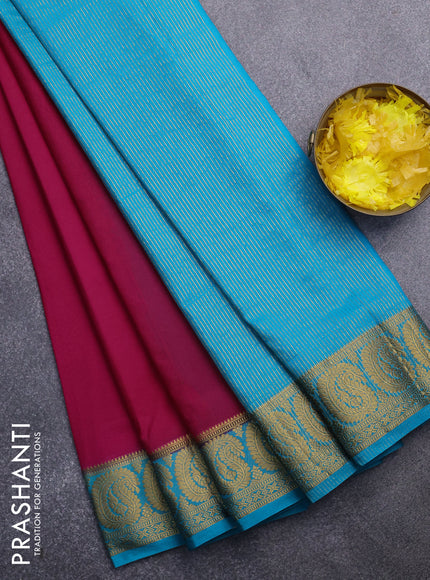 Semi crepe saree pink and teal blue with plain body and paisley zari woven border