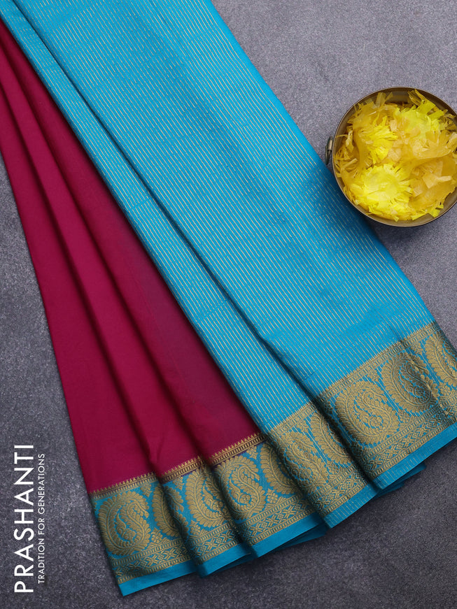 Semi crepe saree pink and teal blue with plain body and paisley zari woven border