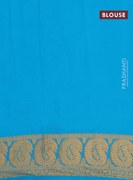 Semi crepe saree pink and teal blue with plain body and paisley zari woven border