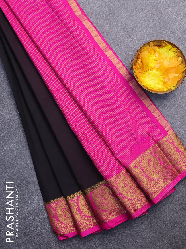 Semi crepe saree black and pink with plain body and paisley zari woven border