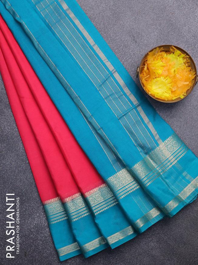 Semi crepe saree peach pink and teal blue shade with plain body and rettapet zari woven border