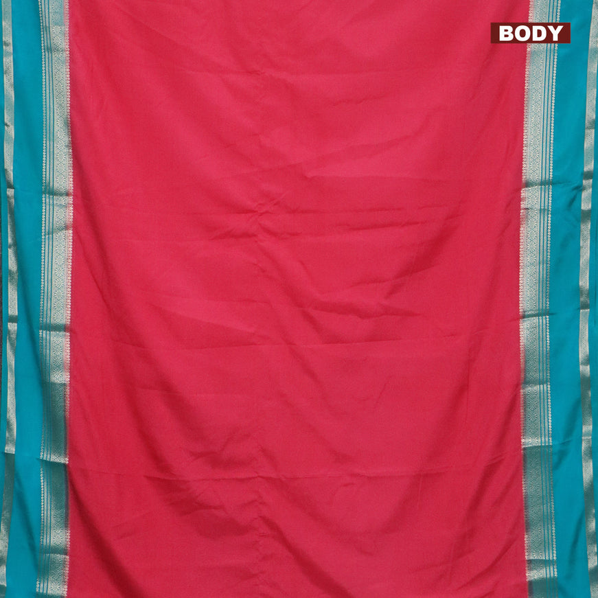 Semi crepe saree peach pink and teal blue shade with plain body and rettapet zari woven border