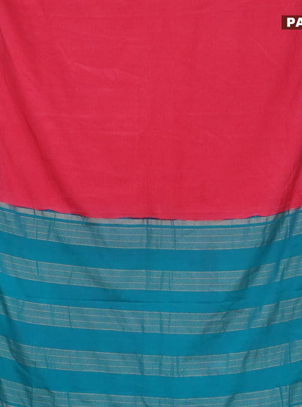 Semi crepe saree peach pink and teal blue shade with plain body and rettapet zari woven border