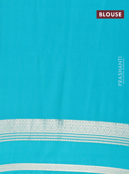 Semi crepe saree peach pink and teal blue shade with plain body and rettapet zari woven border