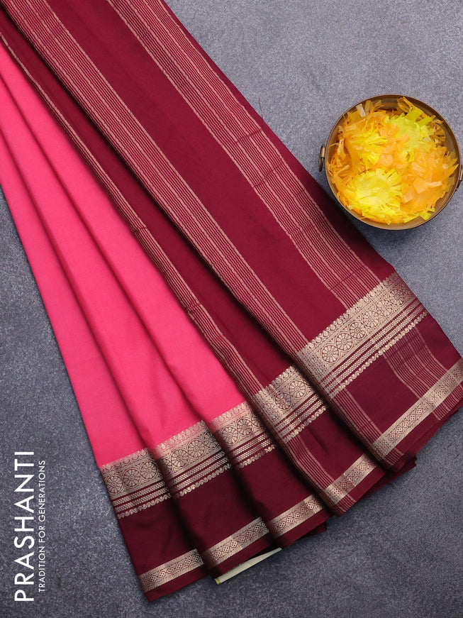 Semi crepe saree peach pink and maroon with plain body and rettapet zari woven border