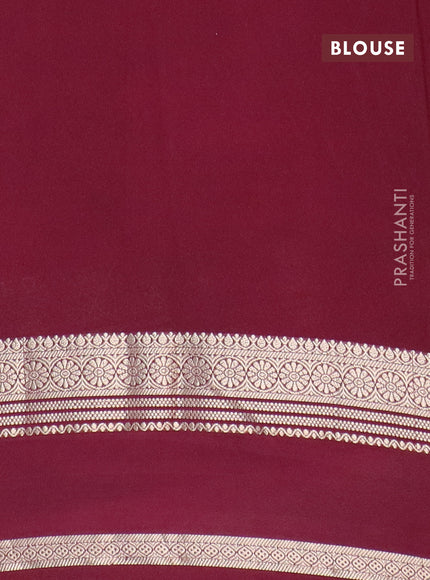 Semi crepe saree peach pink and maroon with plain body and rettapet zari woven border