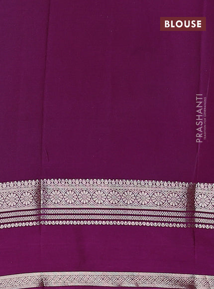 Semi crepe saree teal green and purple with plain body and rettapet zari woven border