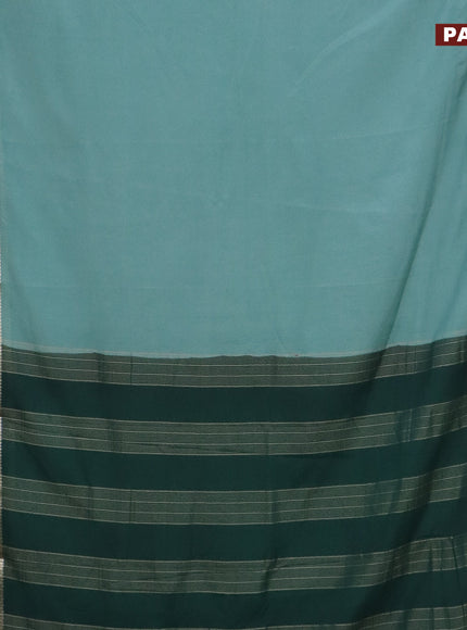 Semi crepe saree pastel green and dark green with plain body and rettapet zari woven border