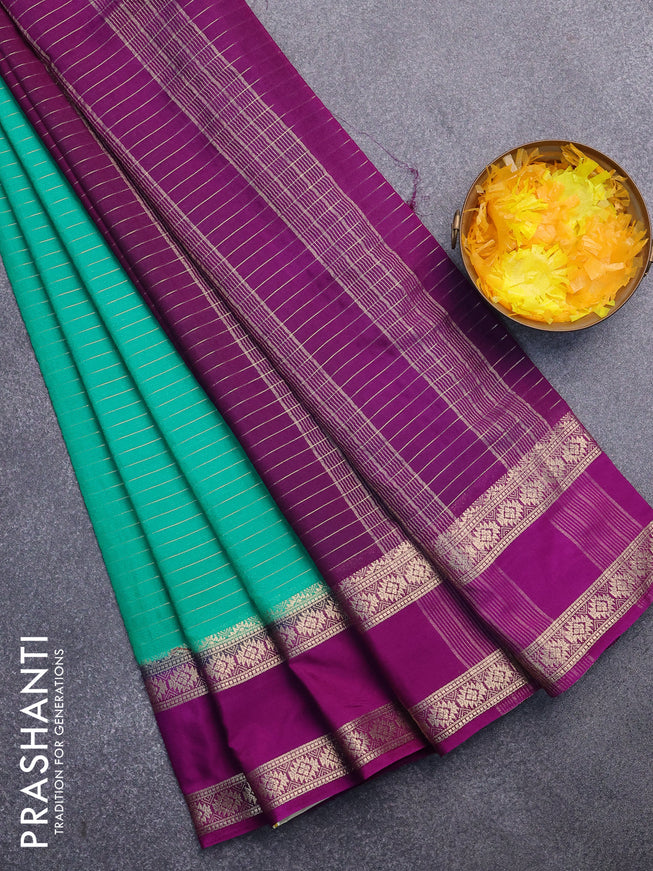 Semi crepe saree teal green and purple with allover zari stripe pattern and rettapet zari woven border