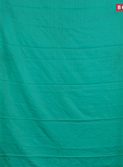 Semi crepe saree teal green and purple with allover zari stripe pattern and rettapet zari woven border