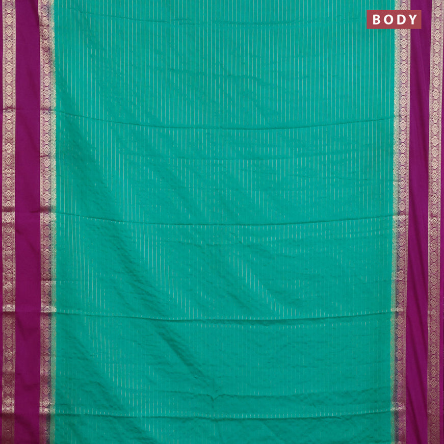 Semi crepe saree teal green and purple with allover zari stripe pattern and rettapet zari woven border