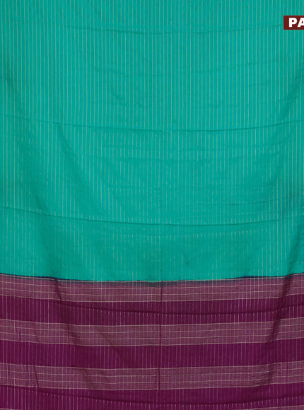 Semi crepe saree teal green and purple with allover zari stripe pattern and rettapet zari woven border