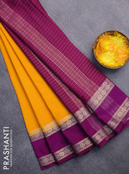 Semi crepe saree mango yellow and purple with allover zari stripe pattern and rettapet zari woven border