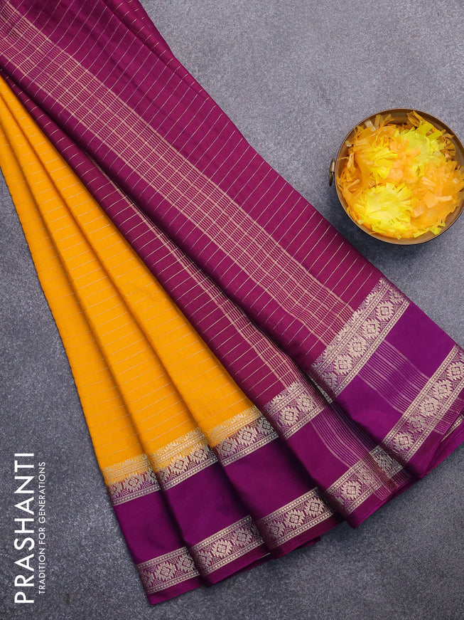 Semi crepe saree mango yellow and purple with allover zari stripe pattern and rettapet zari woven border