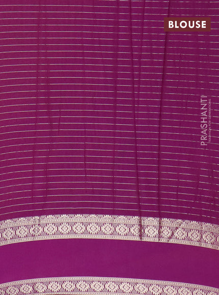 Semi crepe saree mango yellow and purple with allover zari stripe pattern and rettapet zari woven border