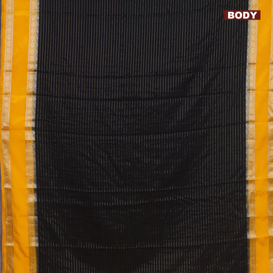 Semi crepe saree black and mango yellow with allover zari stripe pattern and rettapet zari woven border