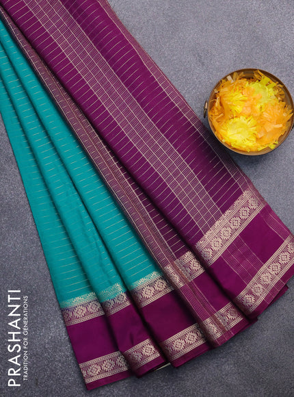 Semi crepe saree teal green shade and purple with allover zari stripe pattern and rettapet zari woven border