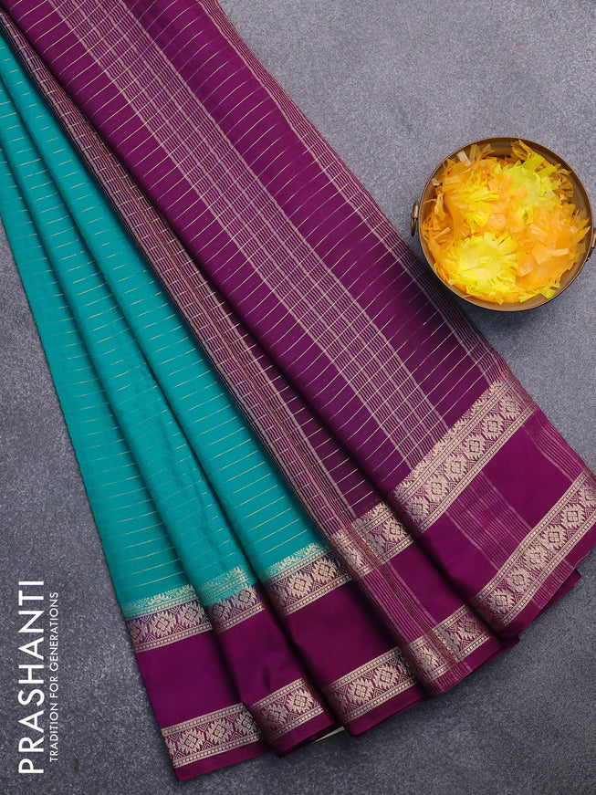 Semi crepe saree teal green shade and purple with allover zari stripe pattern and rettapet zari woven border