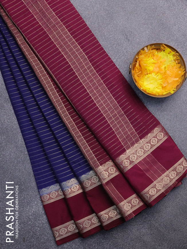 Semi crepe saree navy blue and wine shade with allover zari stripe pattern and rettapet zari woven border