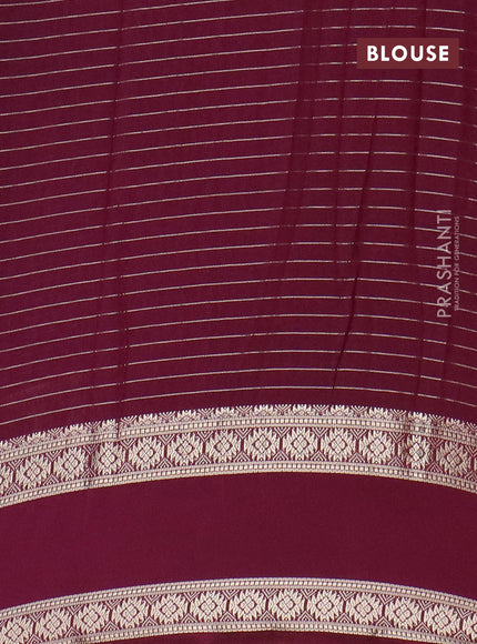 Semi crepe saree navy blue and wine shade with allover zari stripe pattern and rettapet zari woven border