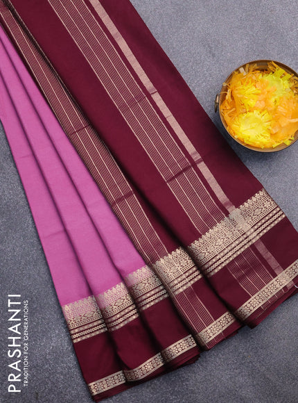 Semi crepe saree mauve pink and wine shade with plain body and rettapet zari woven border