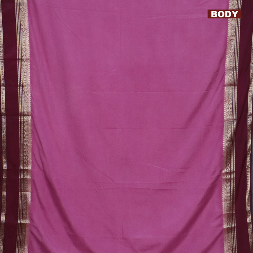 Semi crepe saree mauve pink and wine shade with plain body and rettapet zari woven border