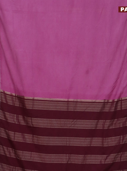 Semi crepe saree mauve pink and wine shade with plain body and rettapet zari woven border