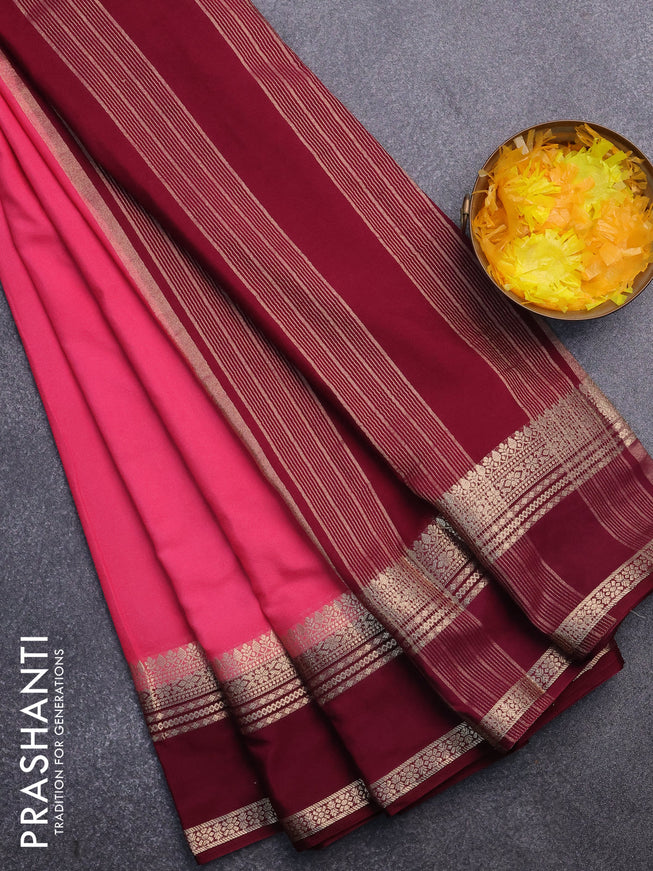 Semi crepe saree peach pink and wine shade with plain body and rettapet zari woven border