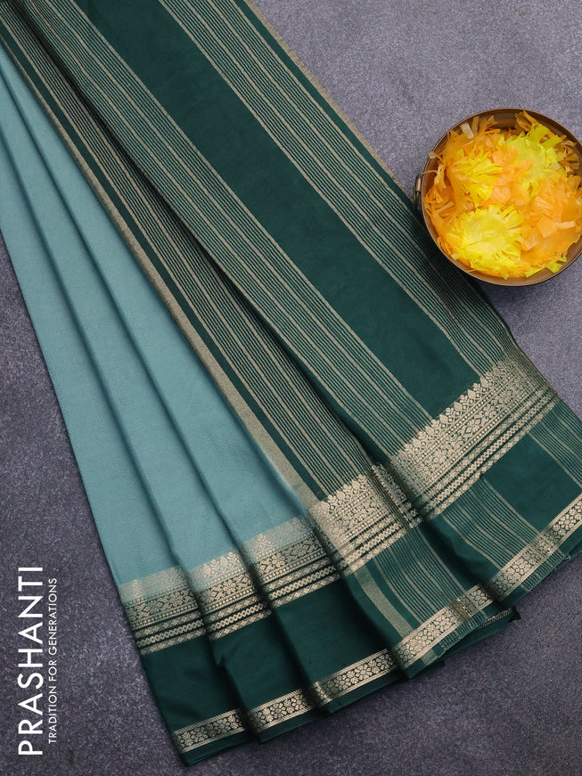 Semi crepe saree pastel green shade and dark green with plain body and rettapet zari woven border