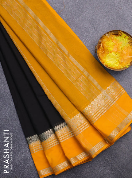 Semi crepe saree black and mango yellow with plain body and rettapet zari woven border