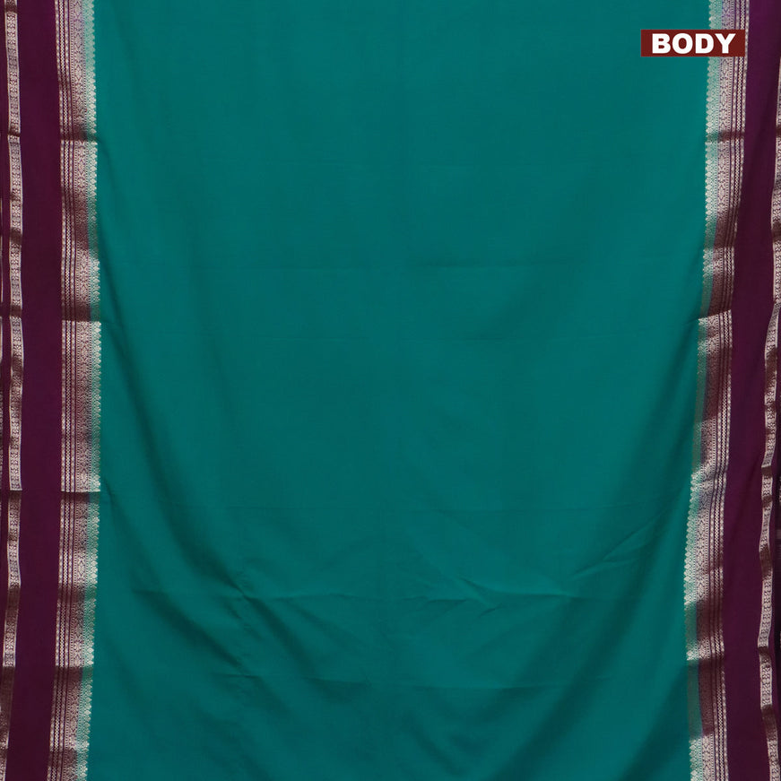 Semi crepe saree teal blue shade and purple with plain body and rettapet zari woven border