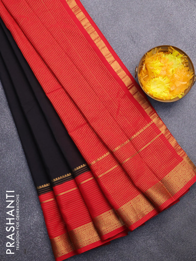 Semi crepe saree black and red with plain body and long zari woven border