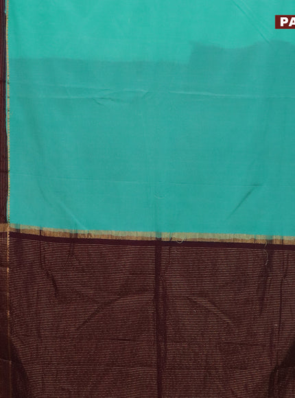 Semi crepe saree teal blue and wine shade with plain body and long zari woven border