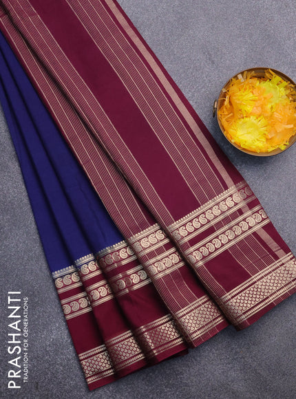 Semi crepe saree dark blue and wine shade with plain body and long rettapet zari woven border